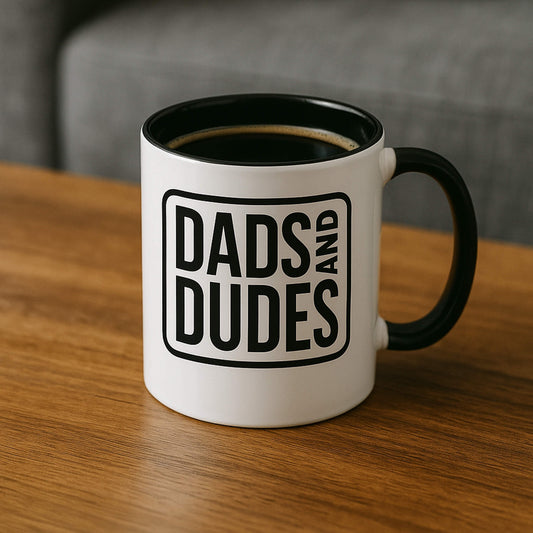 Dads and Dudes Contrast Enamel Mug on coffee table.