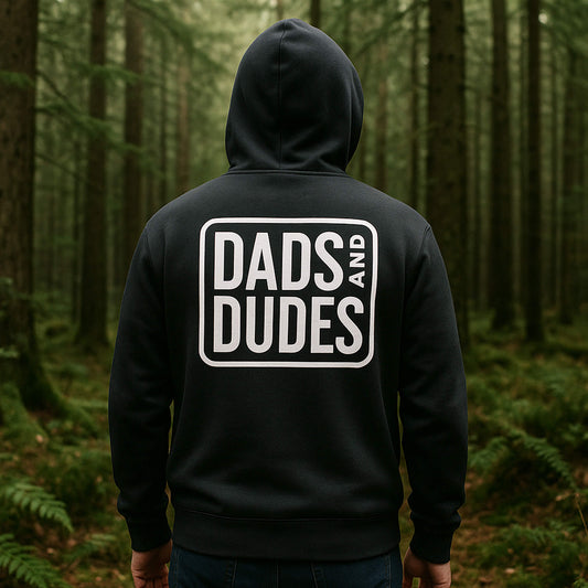 Back view of man wearing a Dads and Dudes Black Hoodie showing the logo back print.