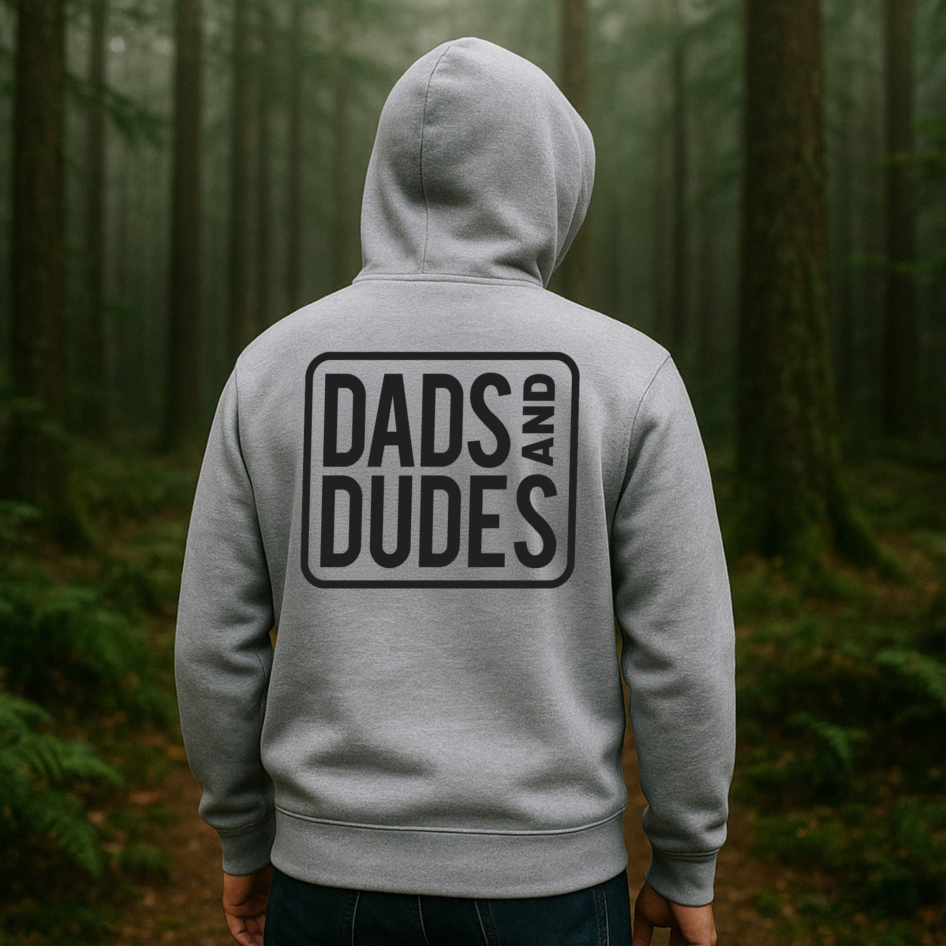 Back view of man wearing a Dads and Dudes Grey Hoodie showing the logo back print.